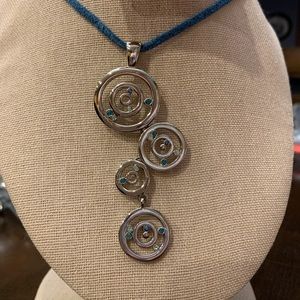 Lia Sophia silver toned circles pendant with blue stones